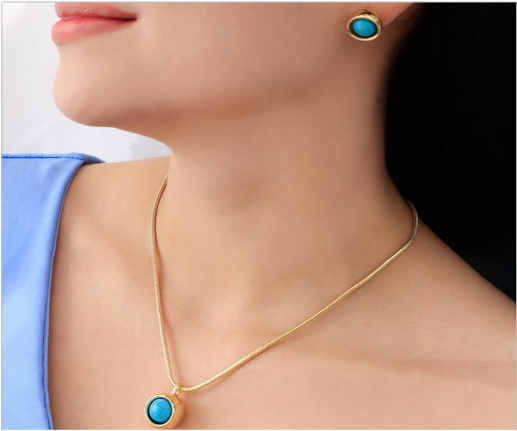 Collar dorado con piedra turquesa