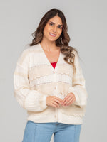 Suéter tejido con detalles artesanales